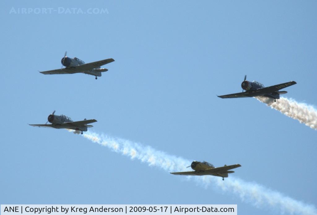 Anoka County-blaine Arpt(janes Field) Airport (ANE) - A T-6 Texan flyover at Blaine Aviation Weekend 2009.
