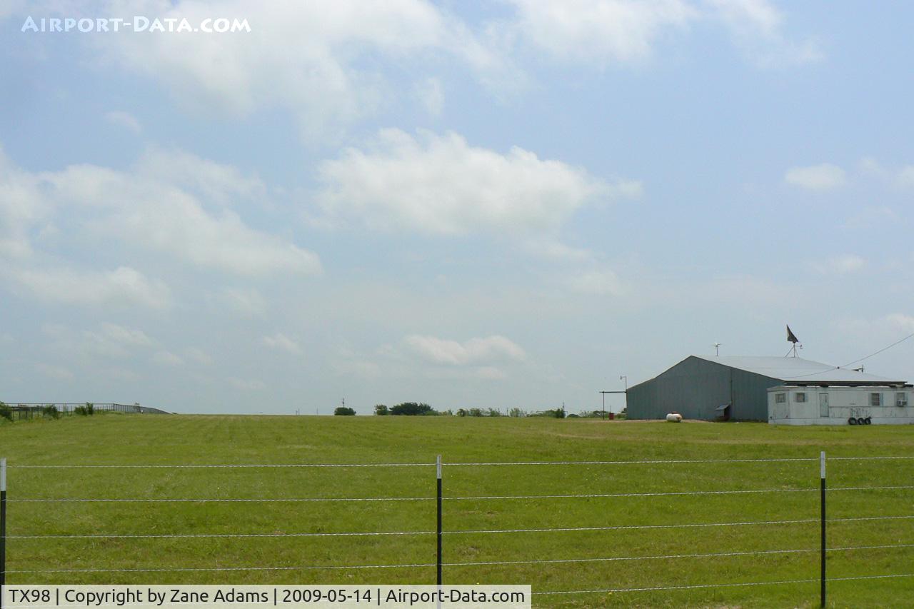 Hawkins Private Airport (TX98) - Hawkins Pirvate Airport east/west runway and hanger (looking east)
