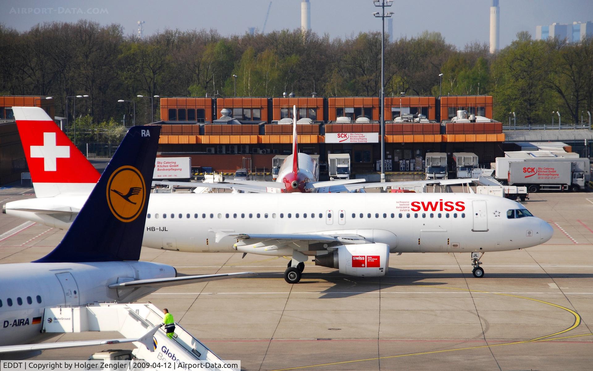 Tegel International Airport (closing in 2011), Berlin Germany (EDDT) - Some go, some stay....