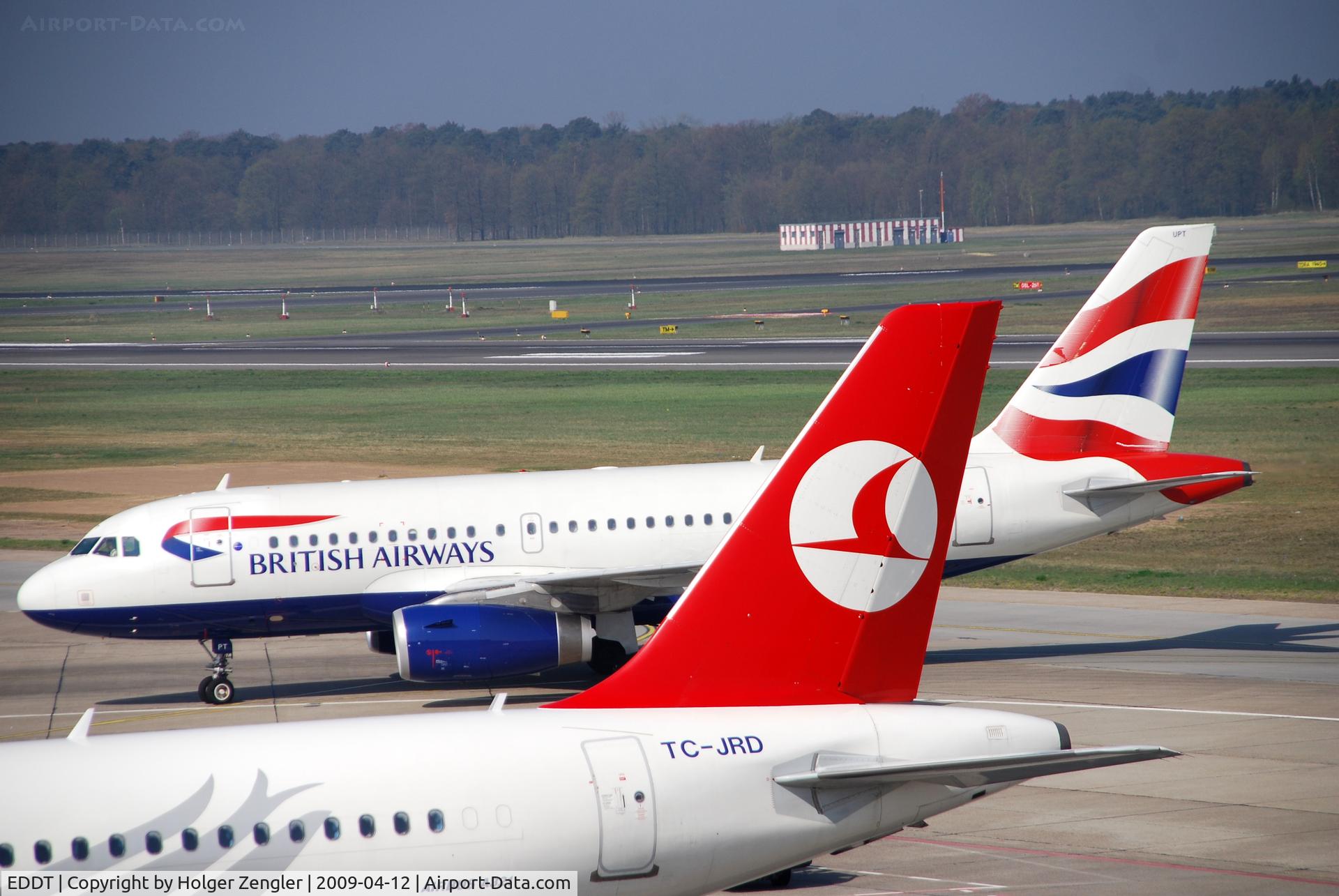 Tegel International Airport (closing in 2011), Berlin Germany (EDDT) - Sisters in red, blue and white