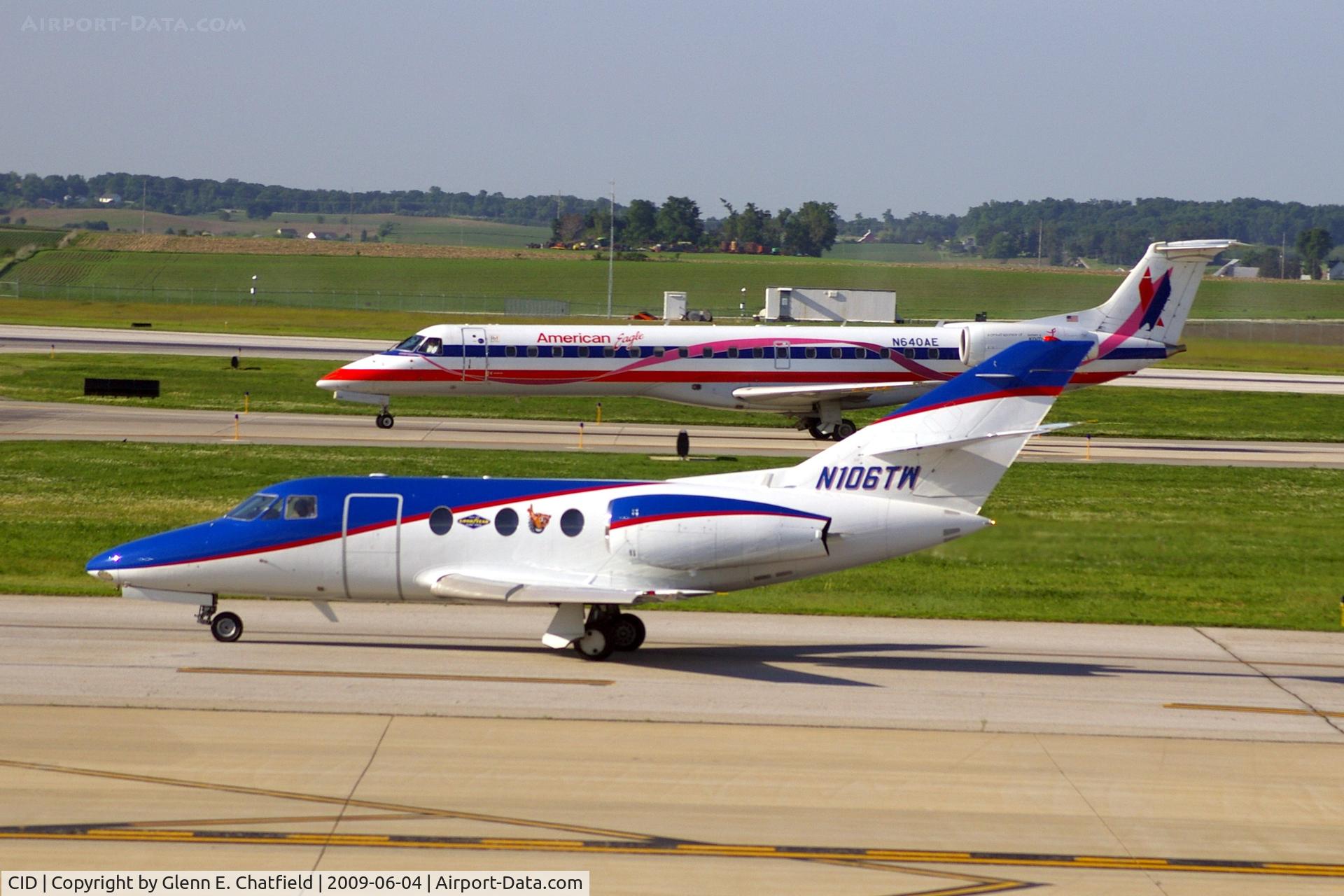 The Eastern Iowa Airport (CID) - Falcon taxiing out to Runway 27, Eagle Flight Taxiing in to the gate after landing Runway 27