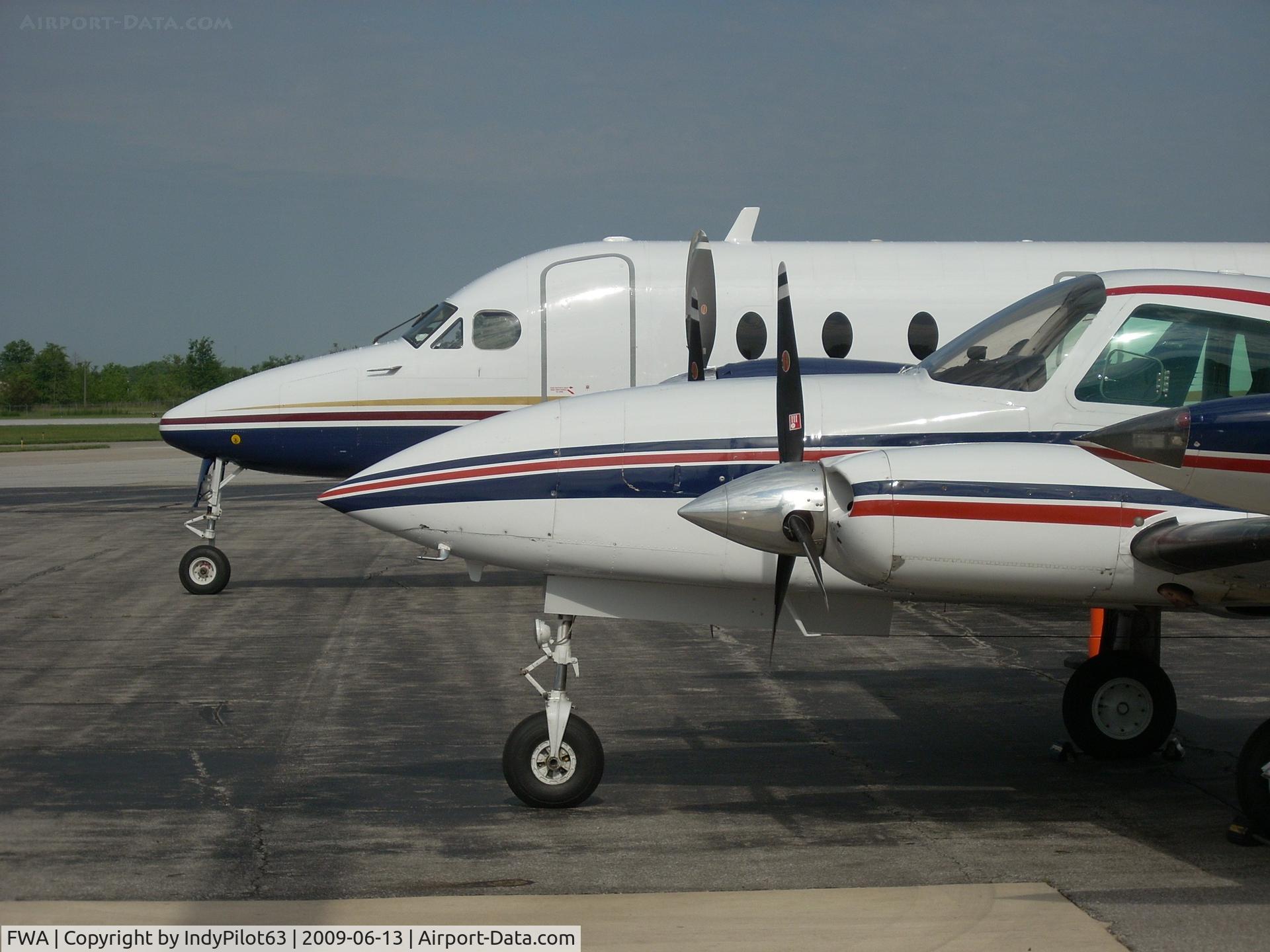 Fort Wayne International Airport (FWA) - Beech Airliner N536M and Cessna 310R N403DM at Atlantic Aviation.
