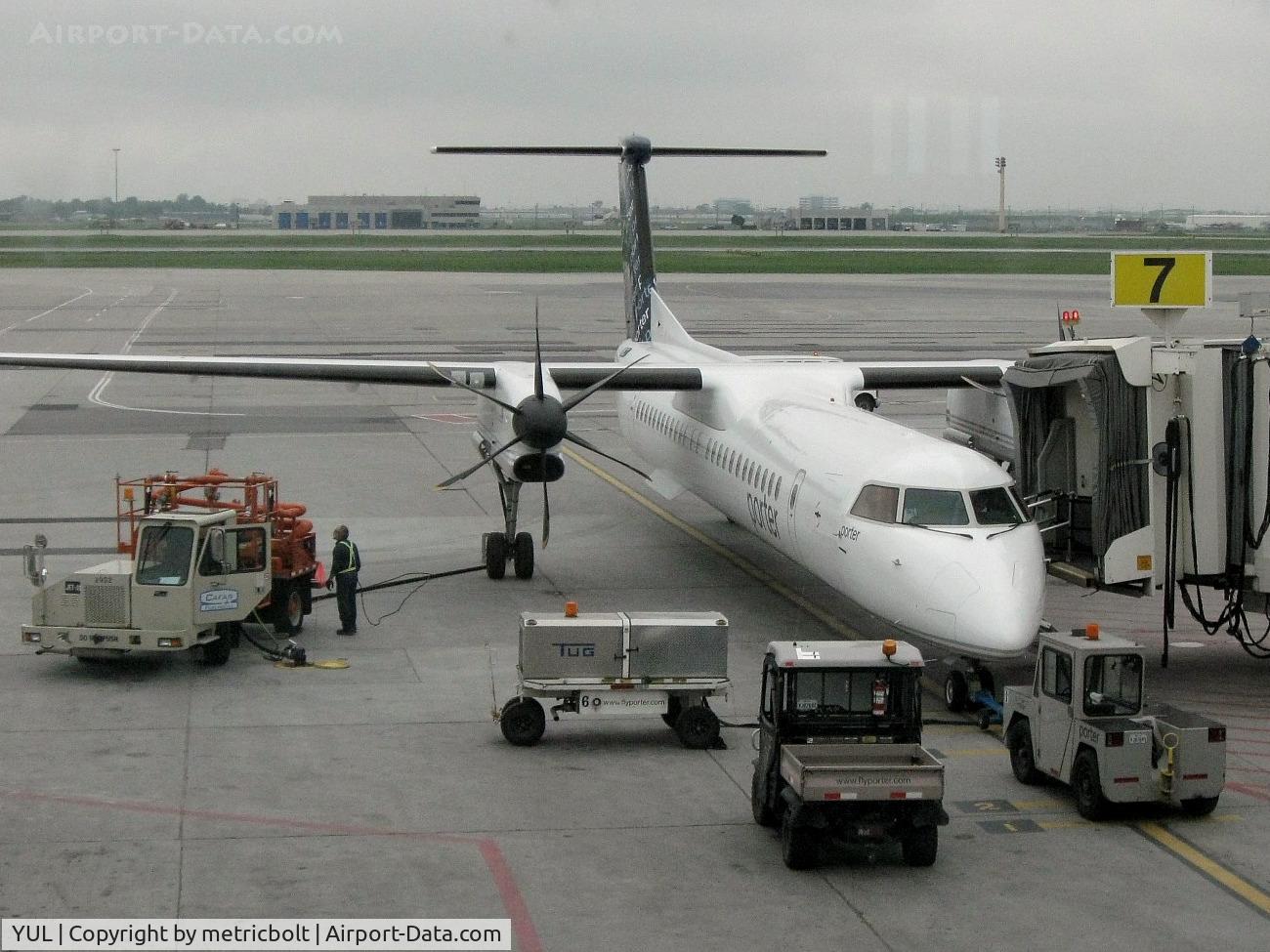 Montréal-Pierre Elliott Trudeau International Airport, Montreal, Quebec Canada (YUL) - Porter Ailines DHC8-402 departure to Toronto Island airport.