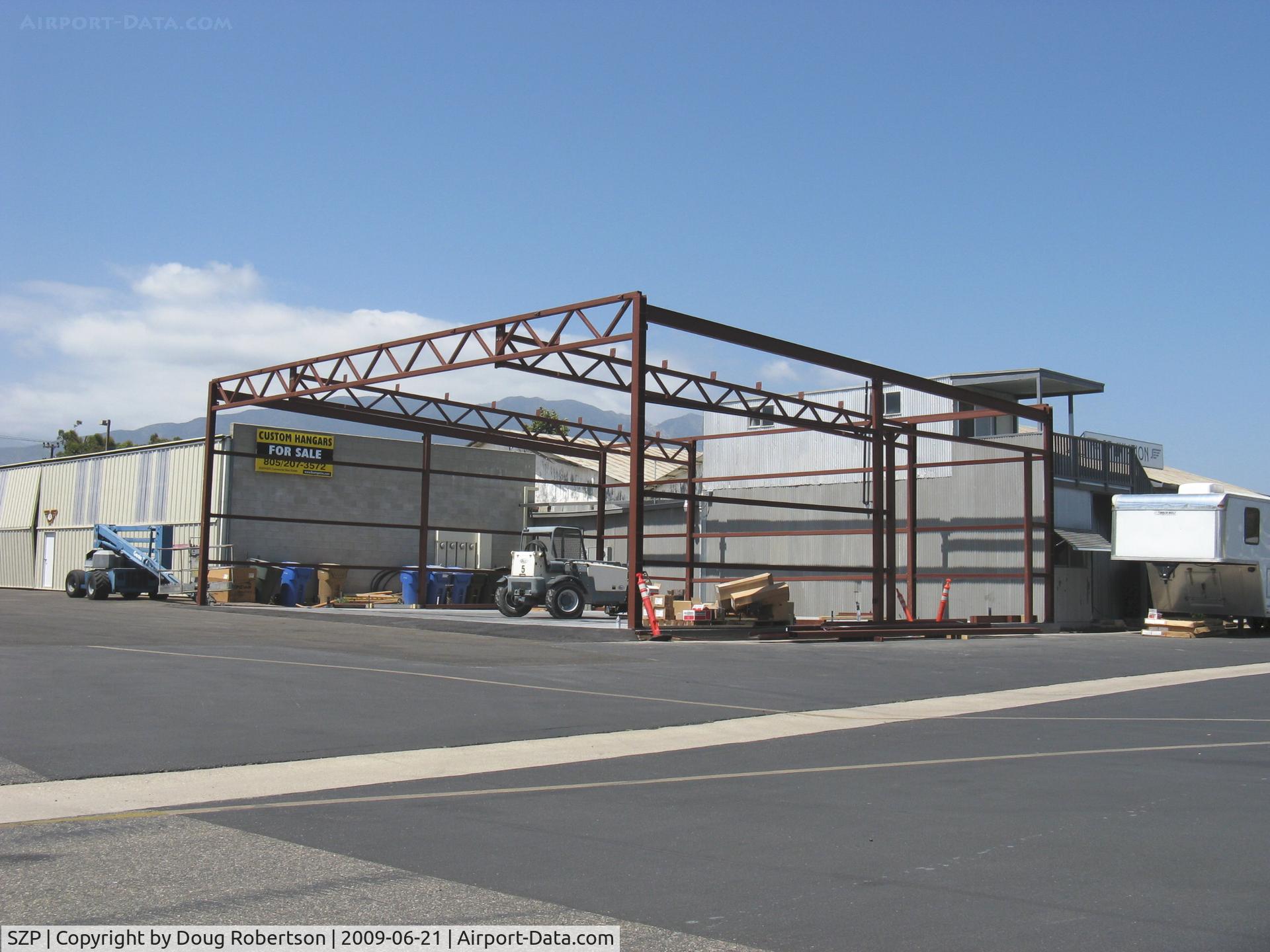 Santa Paula Airport (SZP) - New large hangar with electrical and plumbing under construction. 