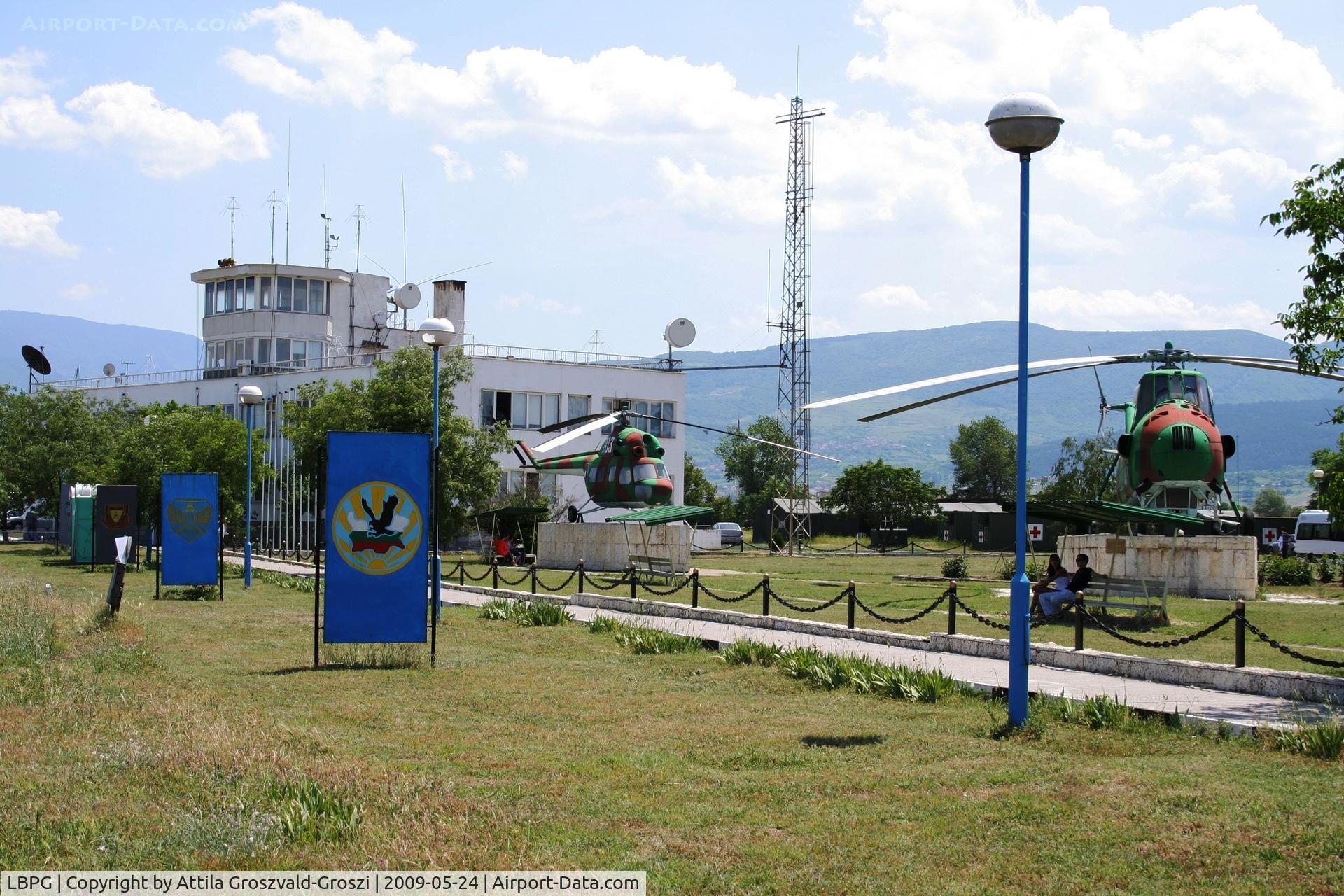 Graf Ignatievo Air Base (military) Airport, Graf Ignatievo / Plovdiv Bulgaria (LBPG) - Graf Ignatievo the control tower of an airplane base, his helicopter memorial park and in the forefront the badges of the aerial squadrons accomplishing a service here.