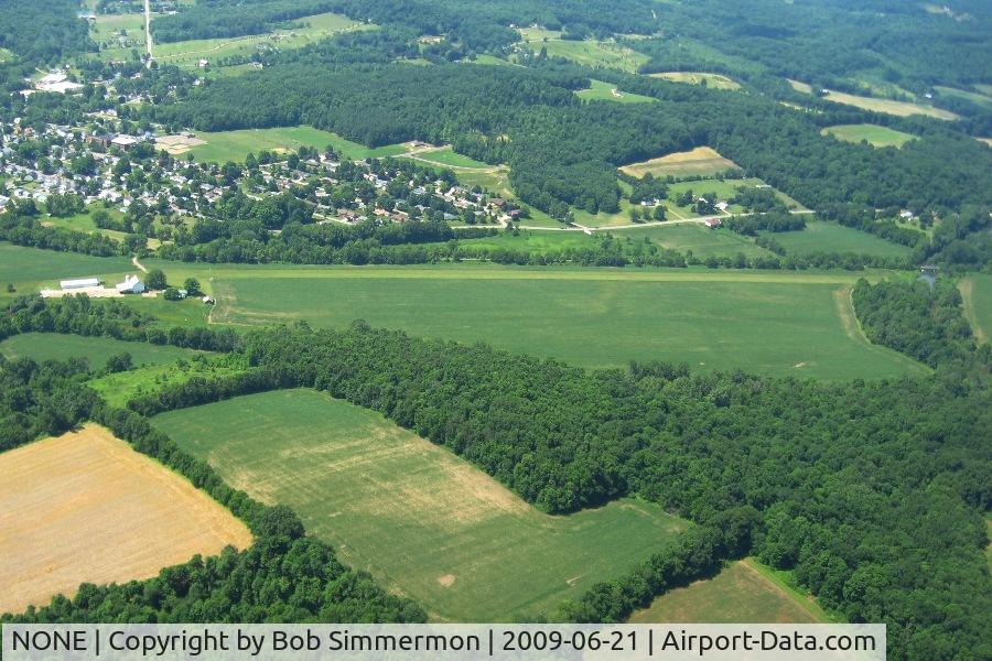 NONE Airport - Unidentified field on the north edge of Butler, Ohio.