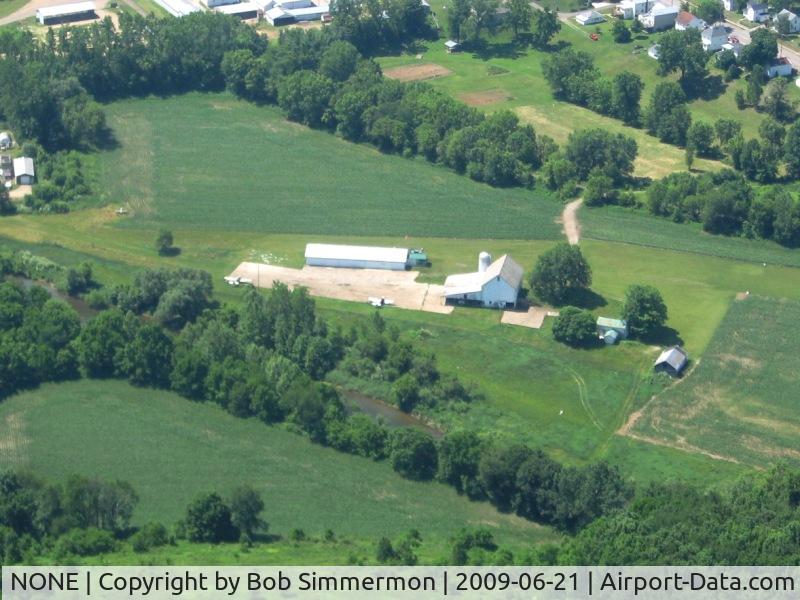 NONE Airport - Unidentified field on the north edge of Butler, Ohio.