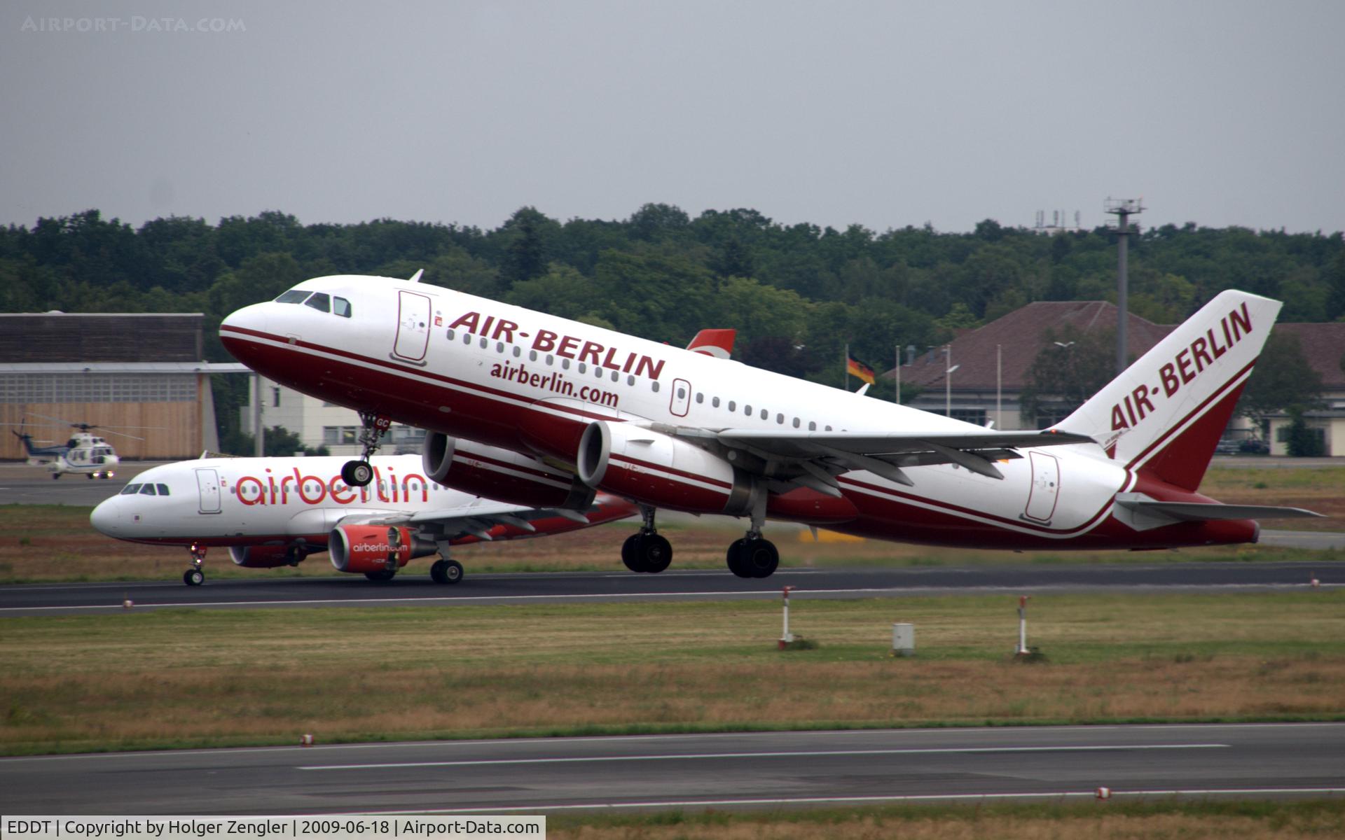 Tegel International Airport (closing in 2011), Berlin Germany (EDDT) - One is going, one is coming, one is still staying.....