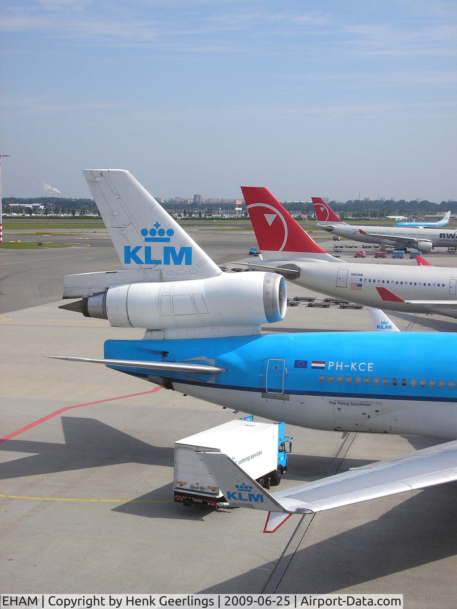 Amsterdam Schiphol Airport, Haarlemmermeer, near Amsterdam Netherlands (EHAM) - Schiphol , Tails from MD-11 and A330