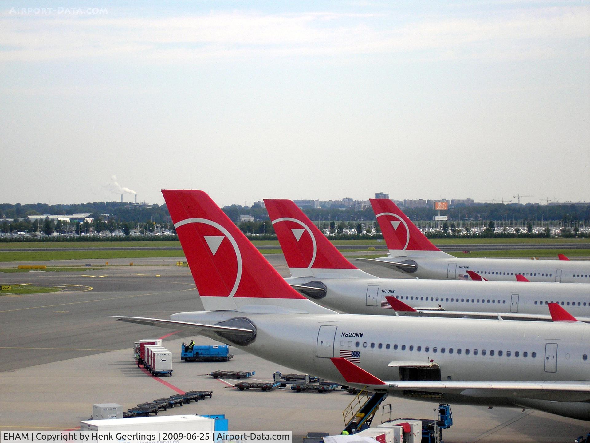 Amsterdam Schiphol Airport, Haarlemmermeer, near Amsterdam Netherlands (EHAM) - Schiphol , E- Pier , Northwest A330 tails