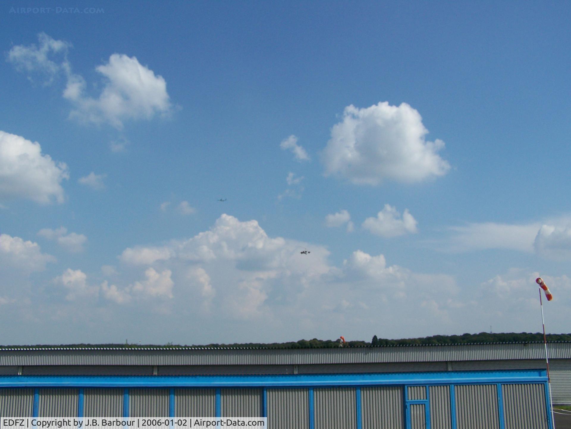 Mainz-Finthen Airport, Mainz Germany (EDFZ) - There were many Gyro-copters out and about on this day.  I was nice to see them about 500' with the traffic from Frankfurt in the background.