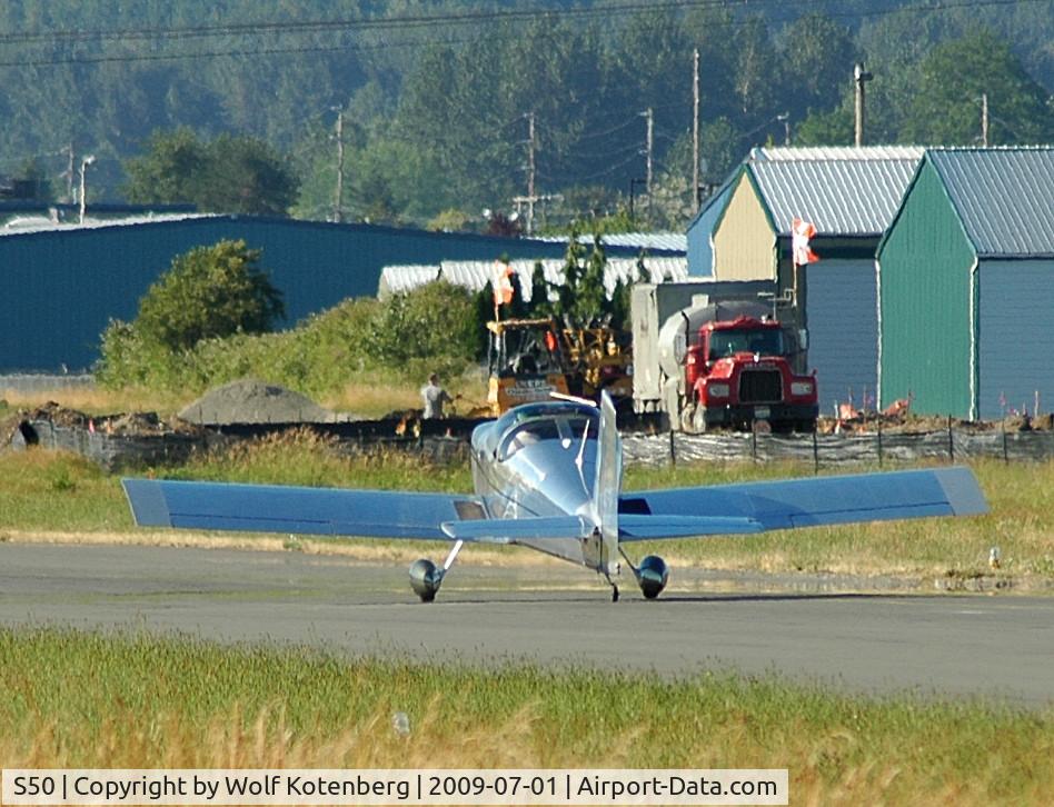 Auburn Municipal Airport (S50) - airport improvement machinery on taxiway