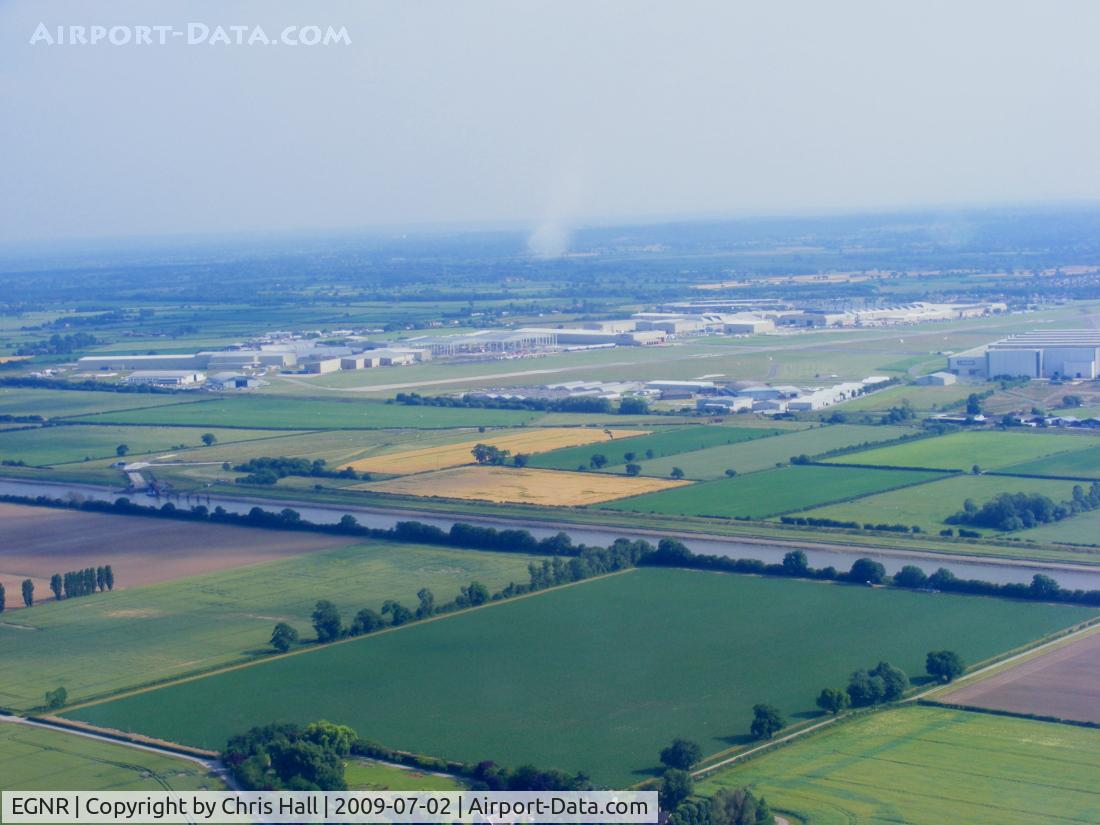 Hawarden Airport, Chester, England United Kingdom (EGNR) - To the right of the picture is the A380 wing factory. The completed wings are transported by road to the small dock that can be seen to the left, where they are transported by barge down the River Dee to Moyston Docks