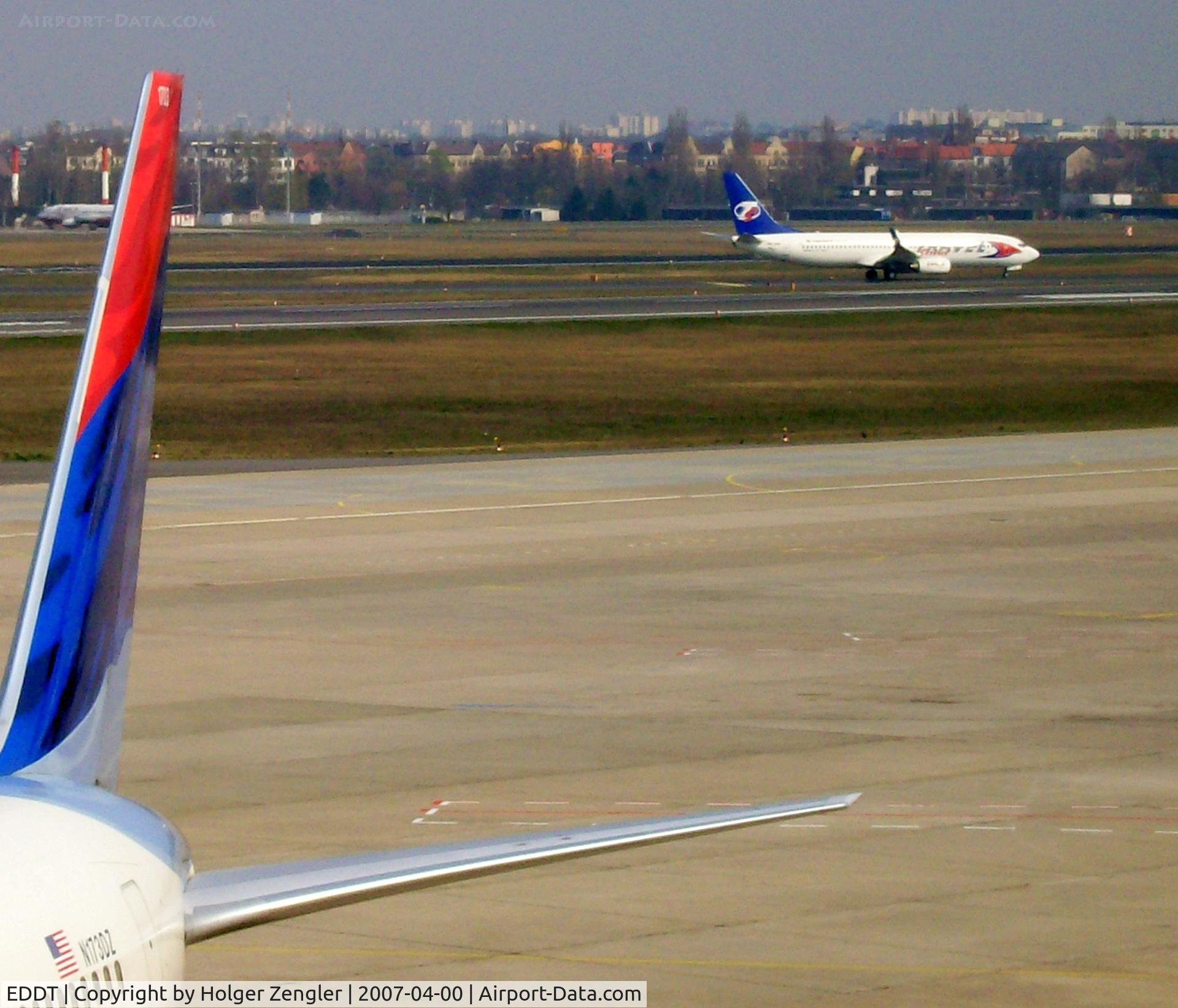 Tegel International Airport (closing in 2011), Berlin Germany (EDDT) - A moment of blue, red and white.