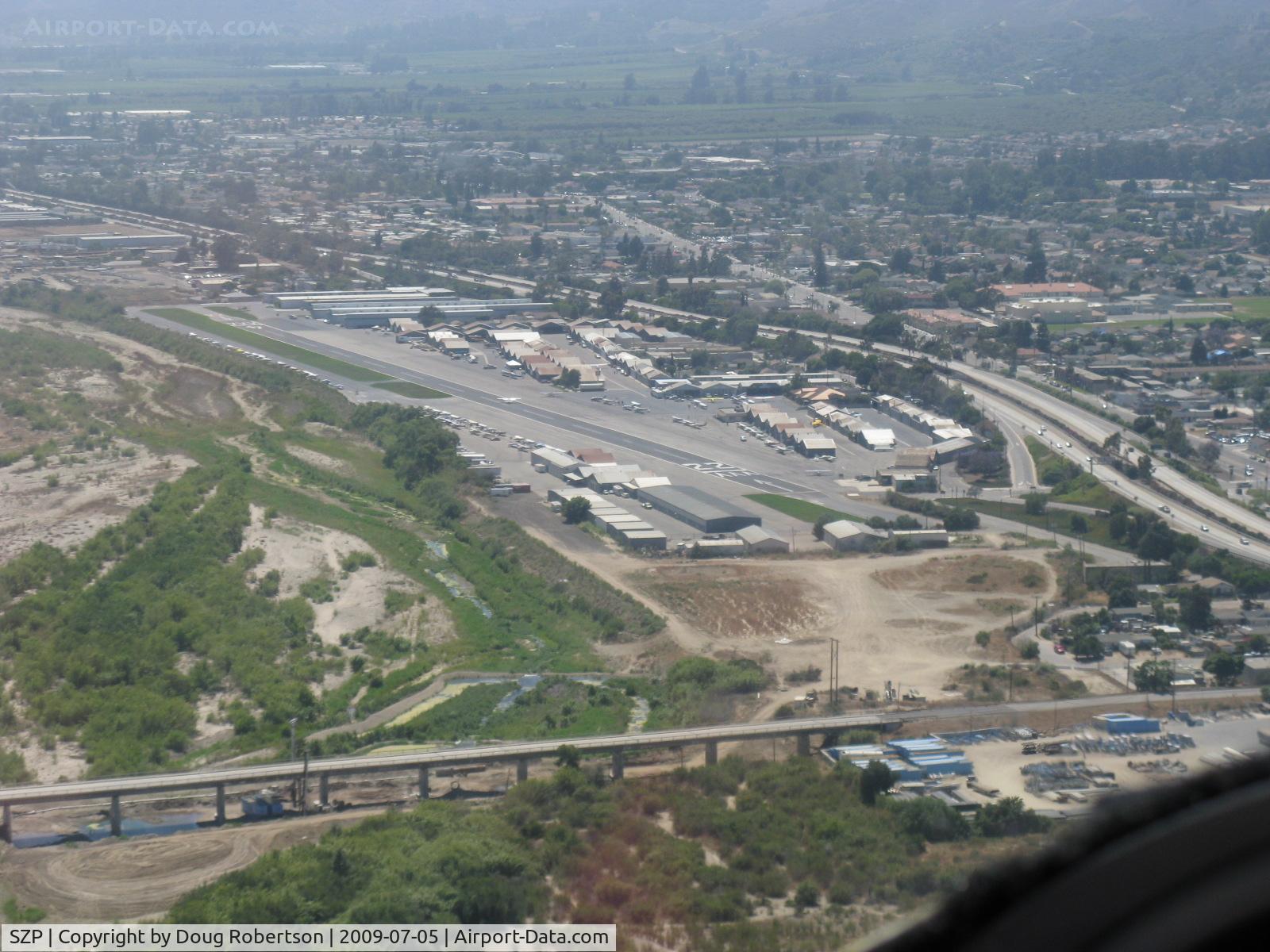 Santa Paula Airport (SZP) - On base leg in N406L, 12th Street Bridge below.