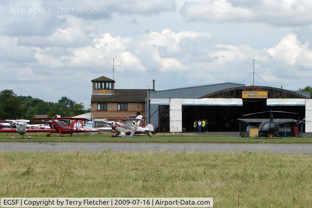 Peterborough Business Airport, Peterborough, England United Kingdom (EGSF) - A view across the runway threshold to Conington Control Tower