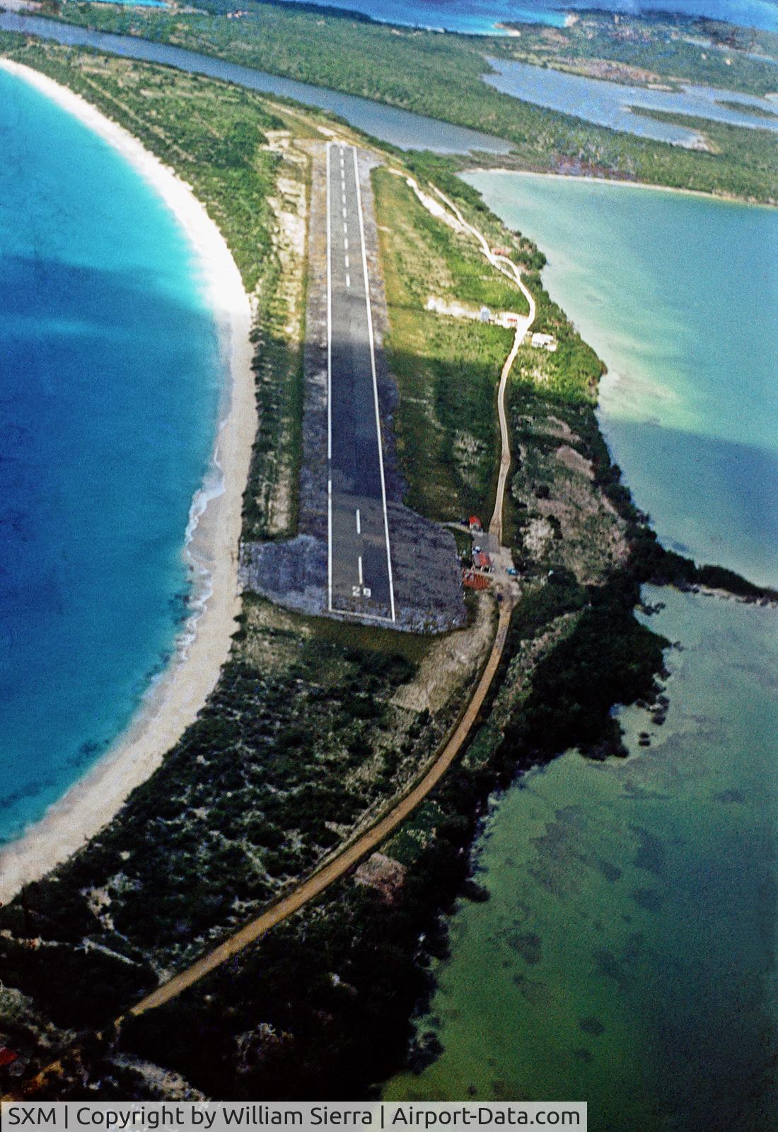 Princess Juliana International Airport, Philipsburg, Sint Maarten Netherlands Antilles (SXM) - Caribair departing St. Marteen during familiarization flight in 1958. Photo was taken by my brother, Jose L. Sierra.