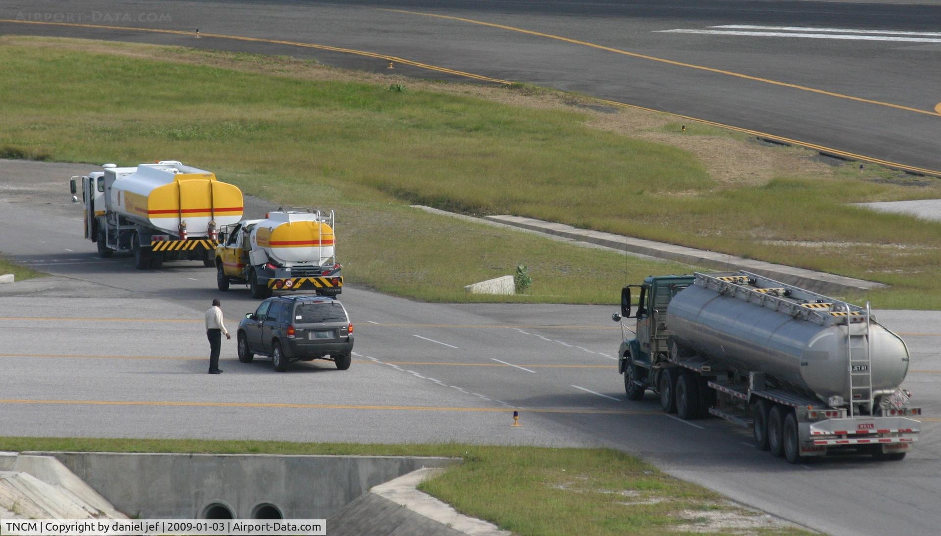 Princess Juliana International Airport, Philipsburg, Sint Maarten Netherlands Antilles (TNCM) - this happens when it get busy at tncm!! things get out of hand. then the ground crew get included......