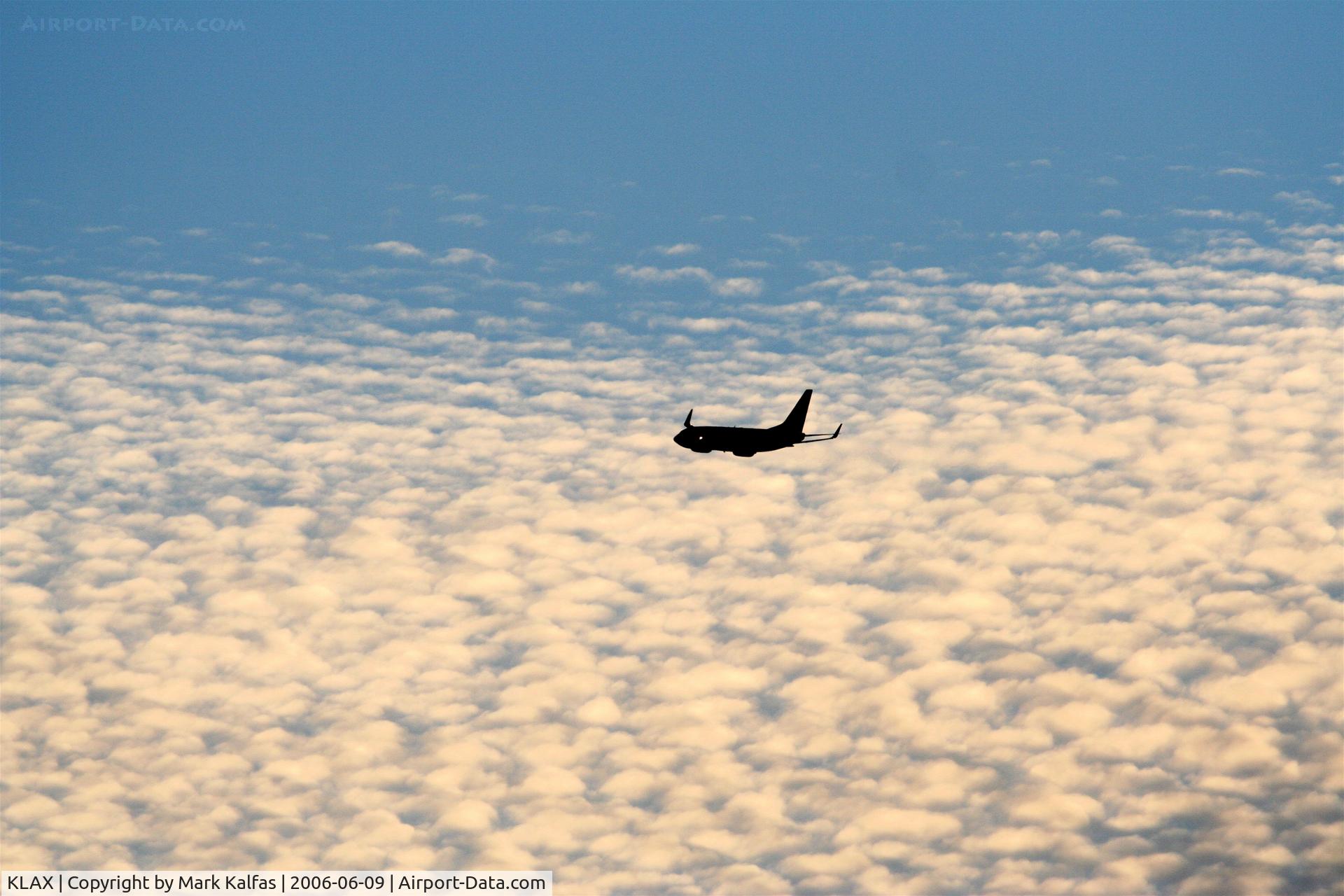Los Angeles International Airport (LAX) - 737 departing at sunset from KLAX.