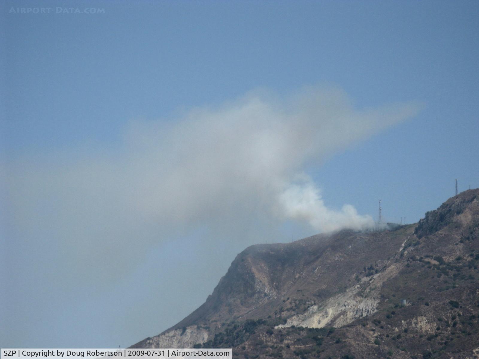 Santa Paula Airport (SZP) - Photo 3 zoomed. South Mountain new fire just noted. Fire Department called.