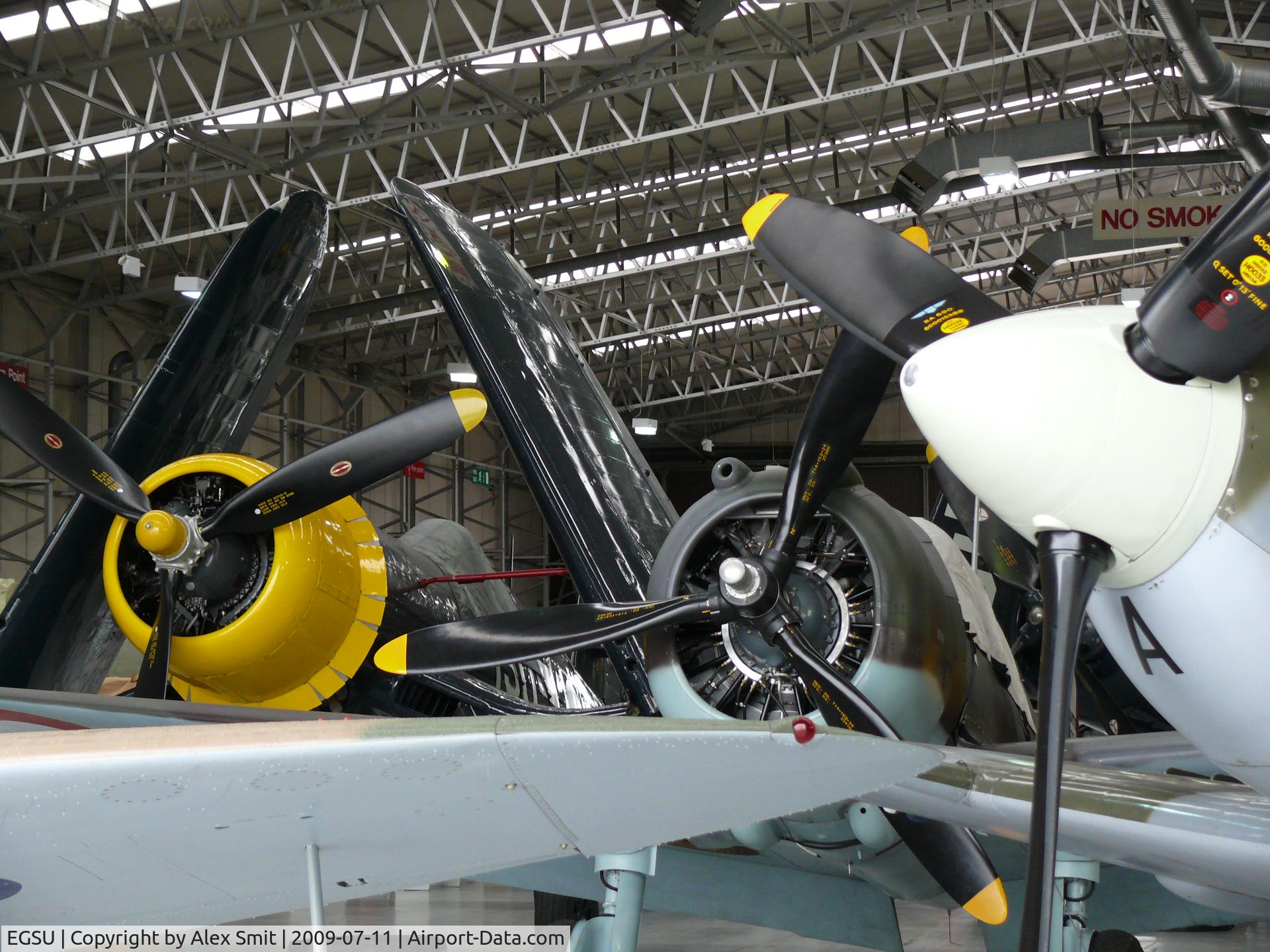 Duxford Airport, Cambridge, England United Kingdom (EGSU) - The Fighter Collection packed in the hangar