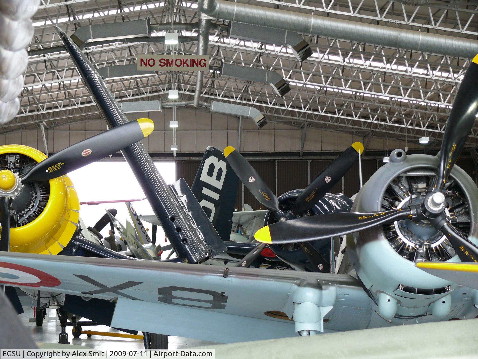 Duxford Airport, Cambridge, England United Kingdom (EGSU) - The Fighter Collection packed in the hangar
