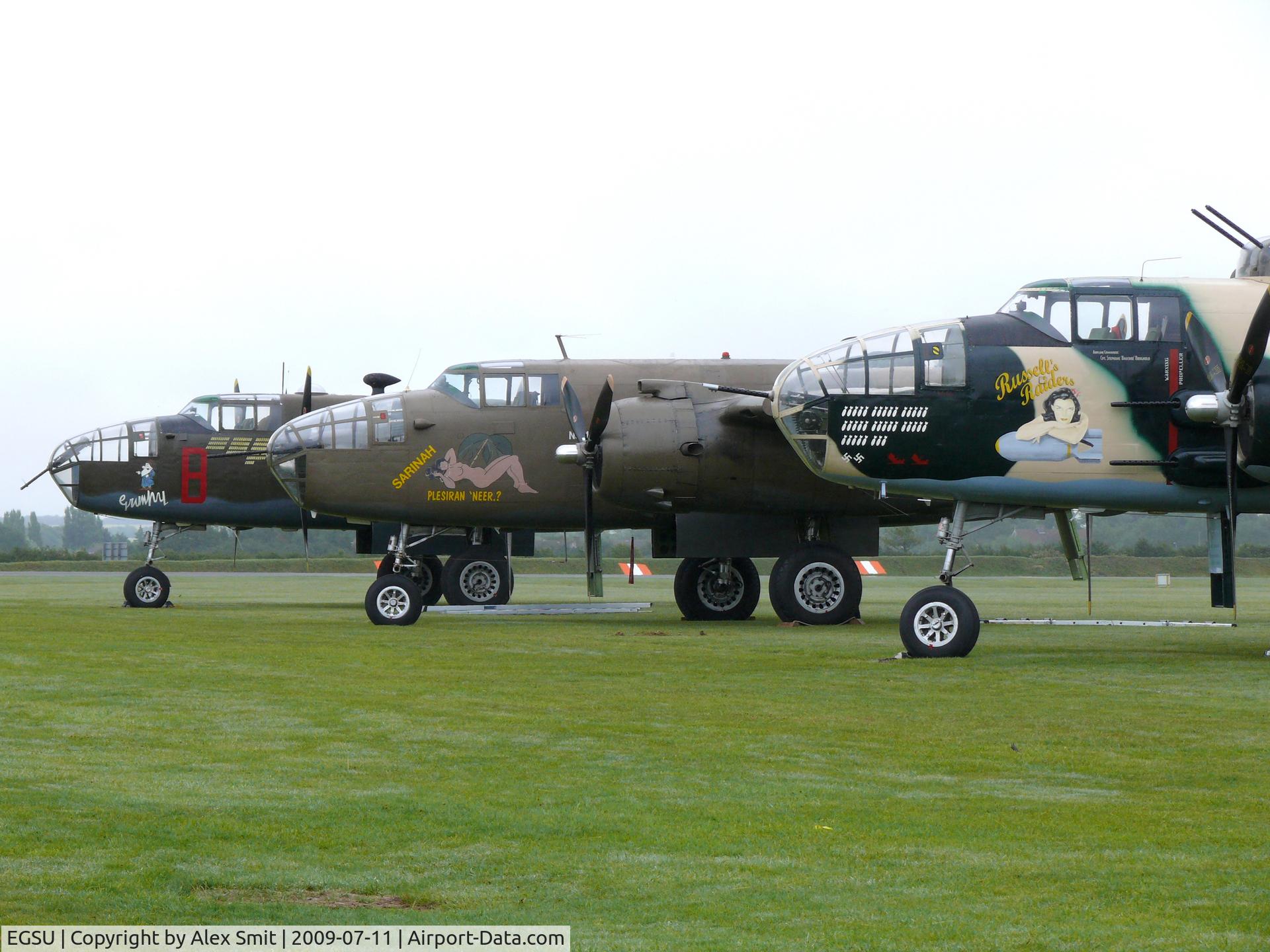 Duxford Airport, Cambridge, England United Kingdom (EGSU) - Mitchells nicely lined up waiting for the action