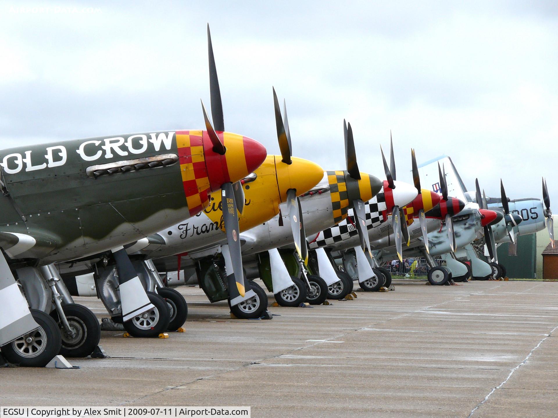 Duxford Airport, Cambridge, England United Kingdom (EGSU) - Nice line-up waiting for the action at the Flying Legends 2009