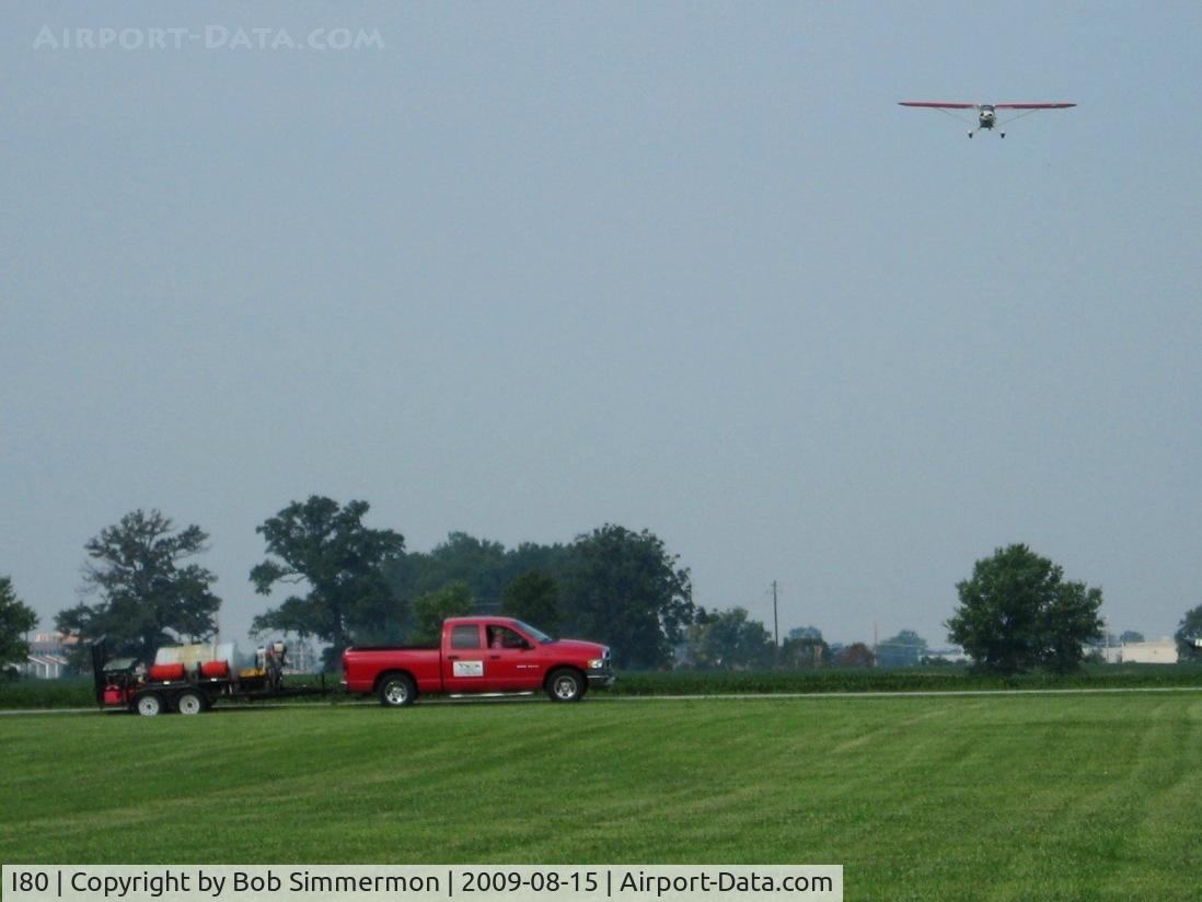 Noblesville Airport (I80) - EAA breakfast fly-in and N4122M on final for RWY 9.  Nice place to park with a load of diesel fuel.