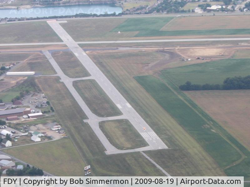 Findlay Airport (FDY) - Looking east at the construction work.  Note the illuminated X on RWY 7