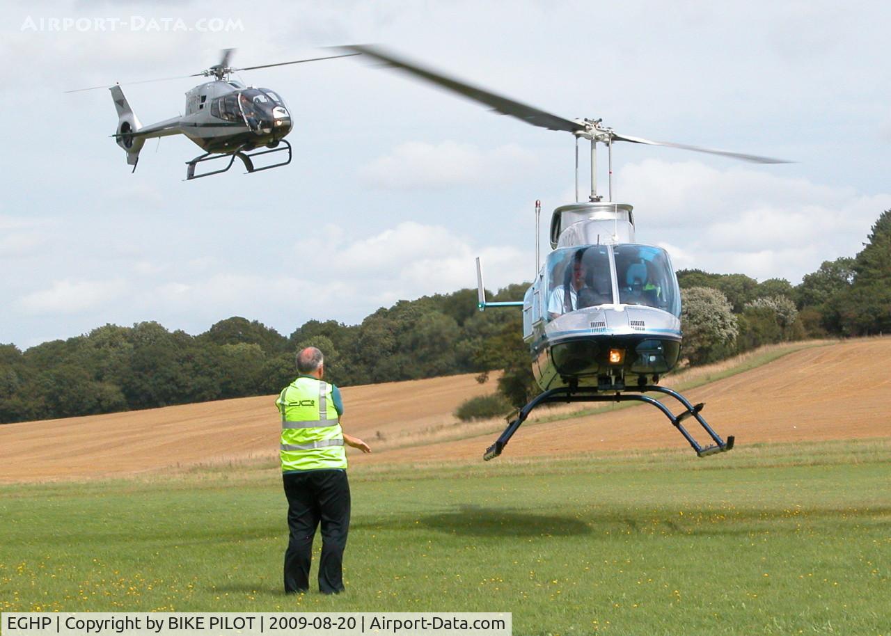 Popham Airfield Airport, Popham, England United Kingdom (EGHP) - STARLIGHT FOUNDATION DAY, THE HELICOPTERS WERE KEPT VERY BUSY 