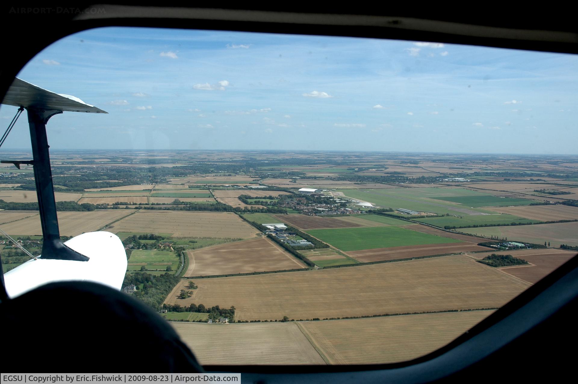 Duxford Airport, Cambridge, England United Kingdom (EGSU) - The Airfield as seen from the Rapide