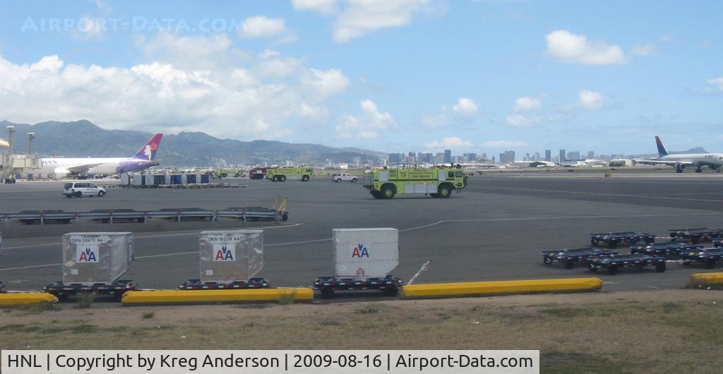 Honolulu International Airport (HNL) - The emergency vehicles lined up along the Ewa Concourse at HNL