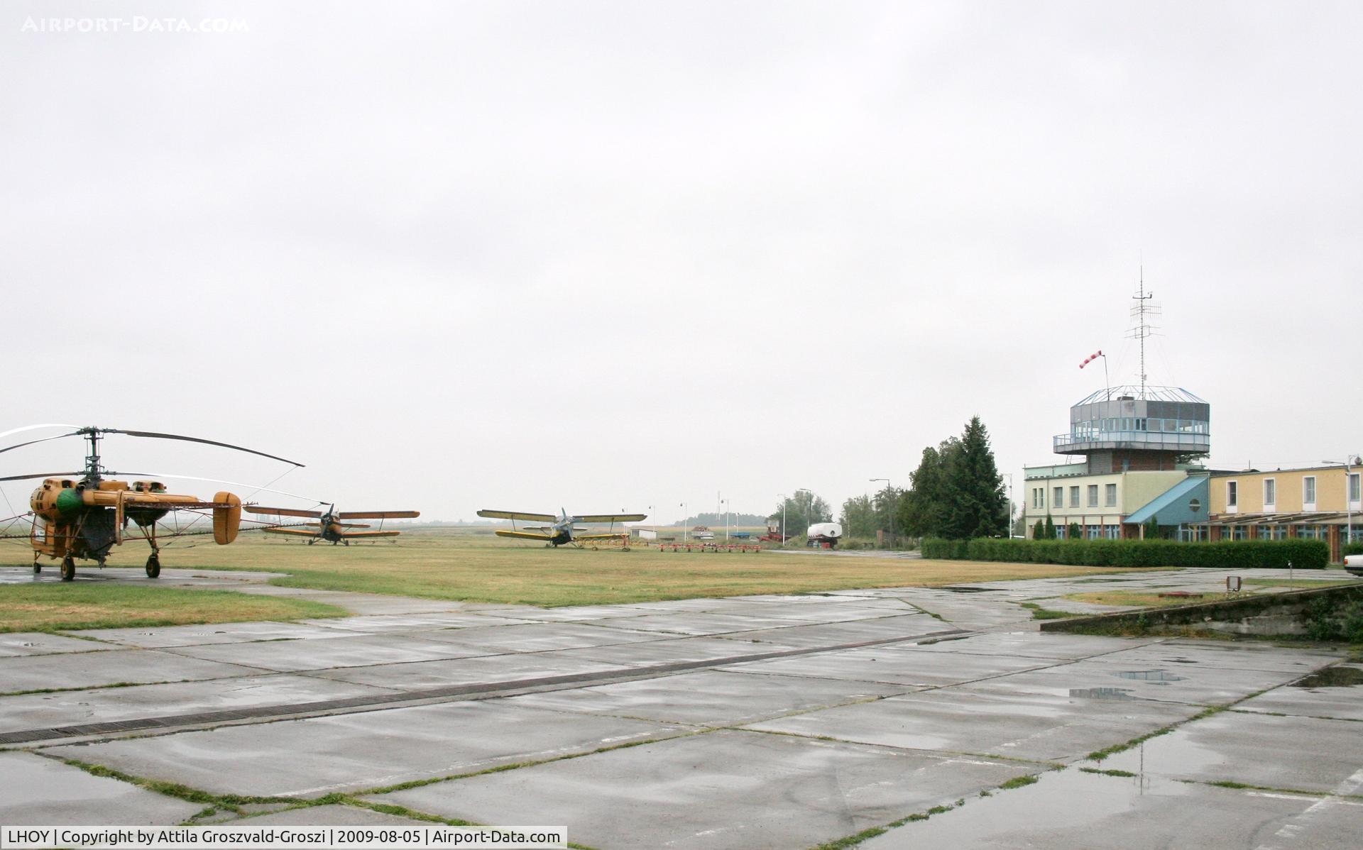 ?csény Airport, ?csény Hungary (LHOY) - Öcsény Airport - Receiving building and directing tower and the agricultural airplane devices being stationed at the area.