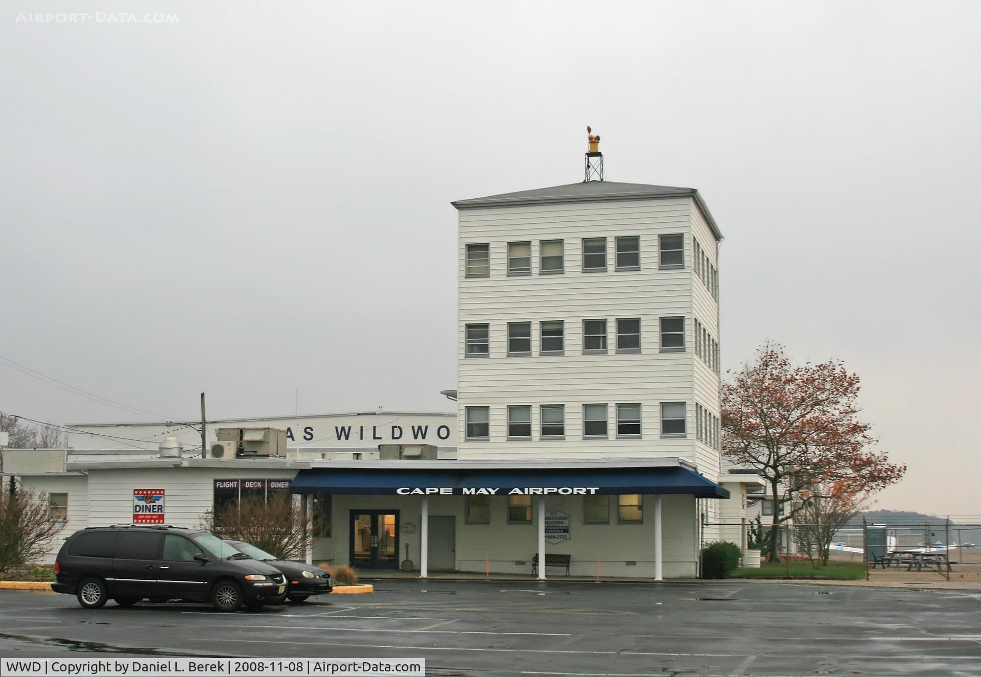 Cape May County Airport (WWD) - This is the main terminal and tower; behind is the historic hangar that gave the airport its original Wildwood name.