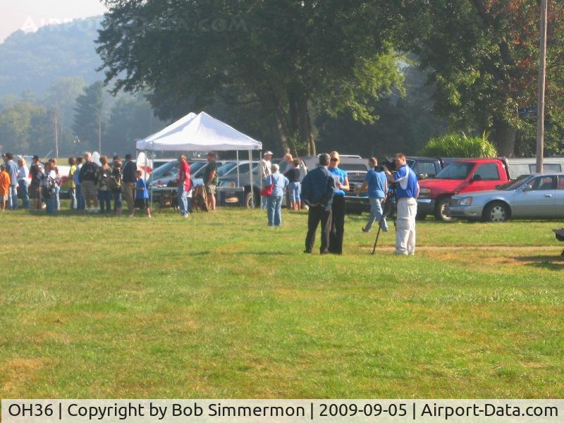 Riverside Airport (OH36) - News crew checking out the EAA fly-in breakfast and Young Eagles event.