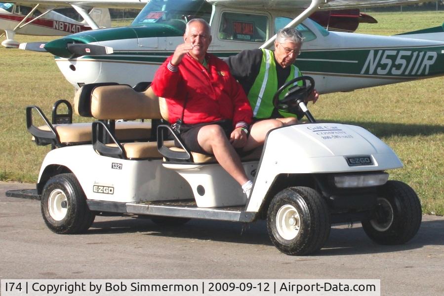 Grimes Field Airport (I74) - Carl & Gordon maintaining order and offering transportation at MERFI 2009