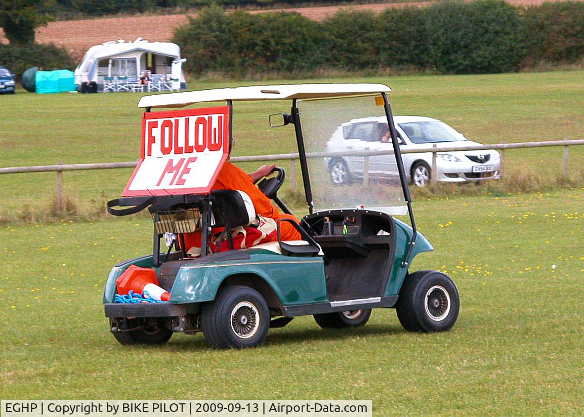 Popham Airfield Airport, Popham, England United Kingdom (EGHP) - JUST IN CASE YOU GET LOST ON THE GOLF COURSE. POPHAM RUSSIAN AIRCRAFT FLY-IN