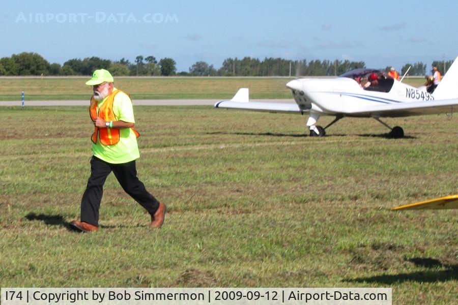 Grimes Field Airport (I74) - Sam hustling to park a plane at the MERFI fly-in.
