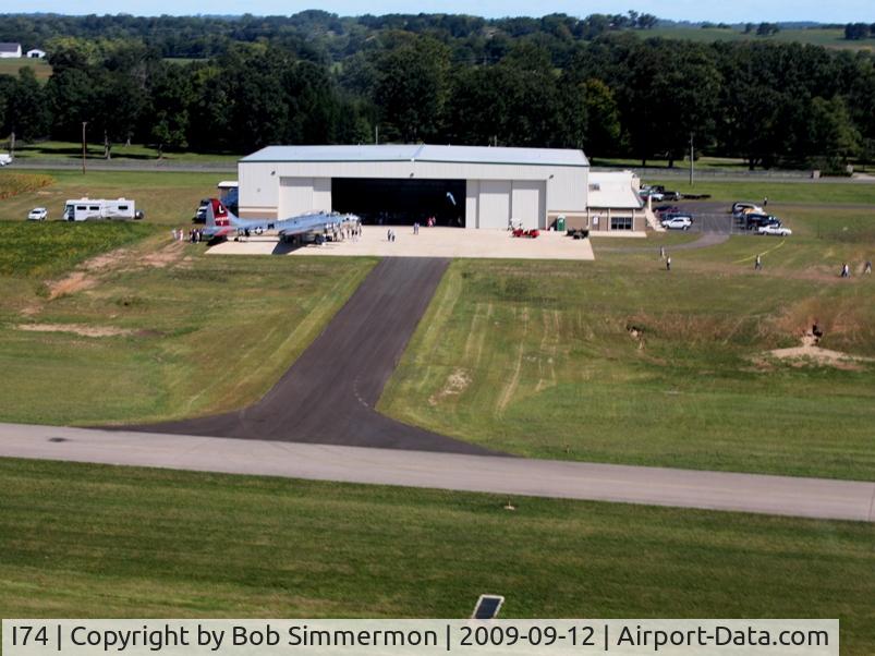 Grimes Field Airport (I74) - Departing RWY 2 over Yankee Lady (N3139G) and the Champaign Aviation Museum.