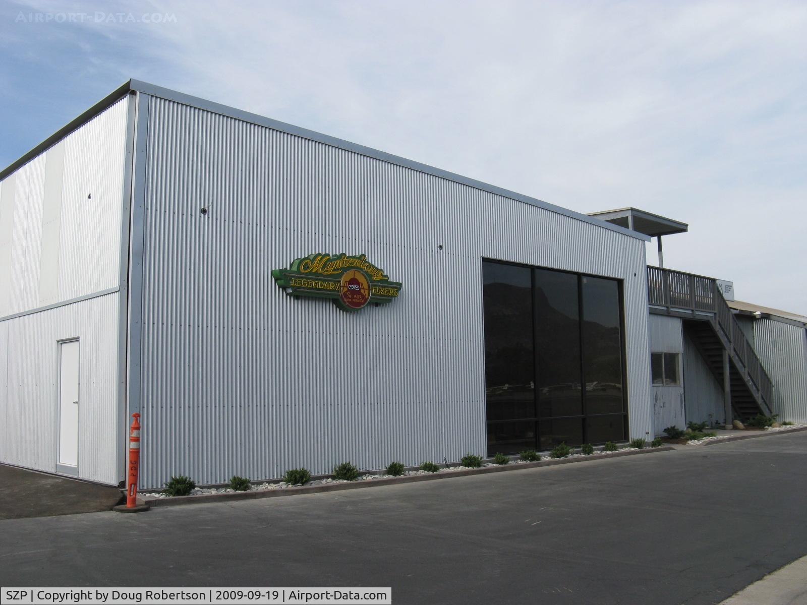 Santa Paula Airport (SZP) - New Hangar Under Construction-new plants at base of hangar wall.