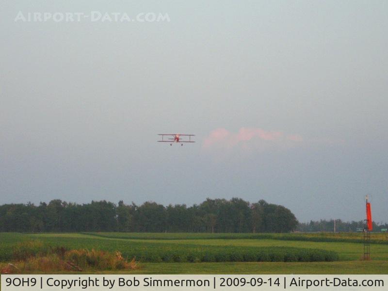 Forest Field Airport (9OH9) - Low pass by N260DH over the strip during the TOPA cookout.