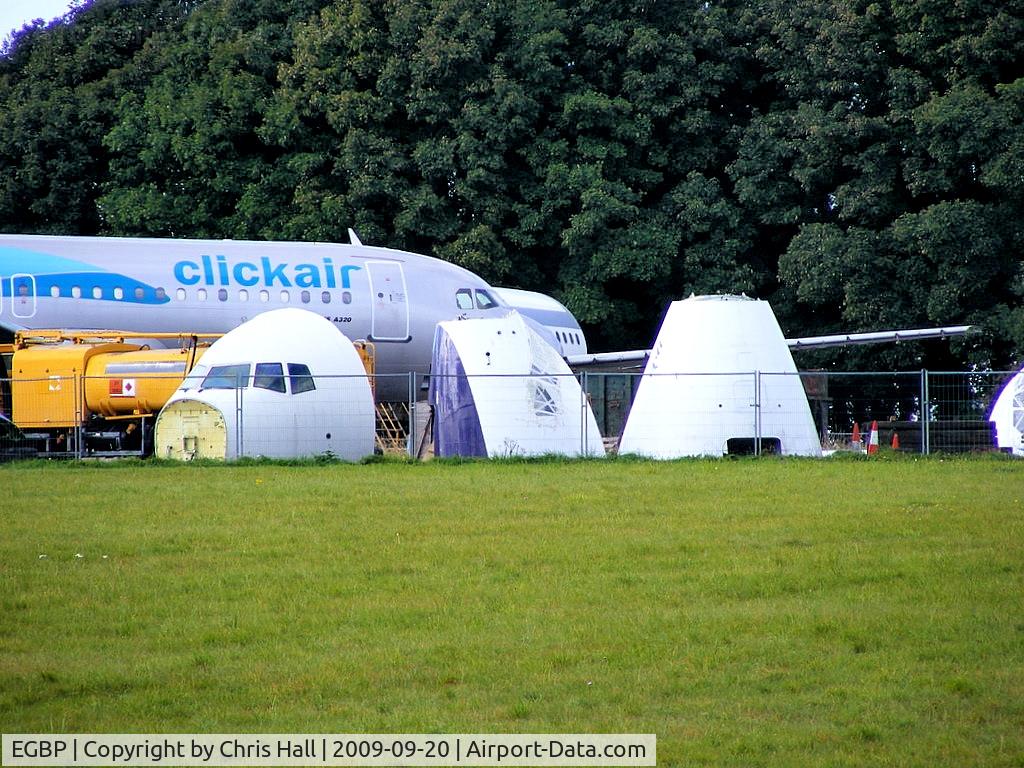 Kemble Airport, Kemble, England United Kingdom (EGBP) - The cockpits of aircraft that have been scrapped by ASI at Kemble, from L to R, Sky Express B737 VP-BBN, British Airways B737 G-LGTG and Monarch B757 G-MOND