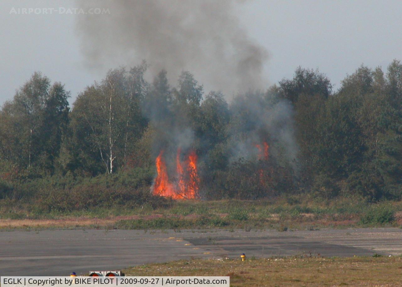 Blackbushe Airport, Camberley, England United Kingdom (EGLK) - BUSH FIRE JUST OUTSIDE THE NORTH EASTERN EDGE OF THE AIRFIELD, UNFORTUNATELY NOT AN UNCOMMON SITE I'VE SEEN FOUR IN THE LAST YEAR SOME ARE BELEIVED TO BE DELIBERATELY STARTED. 