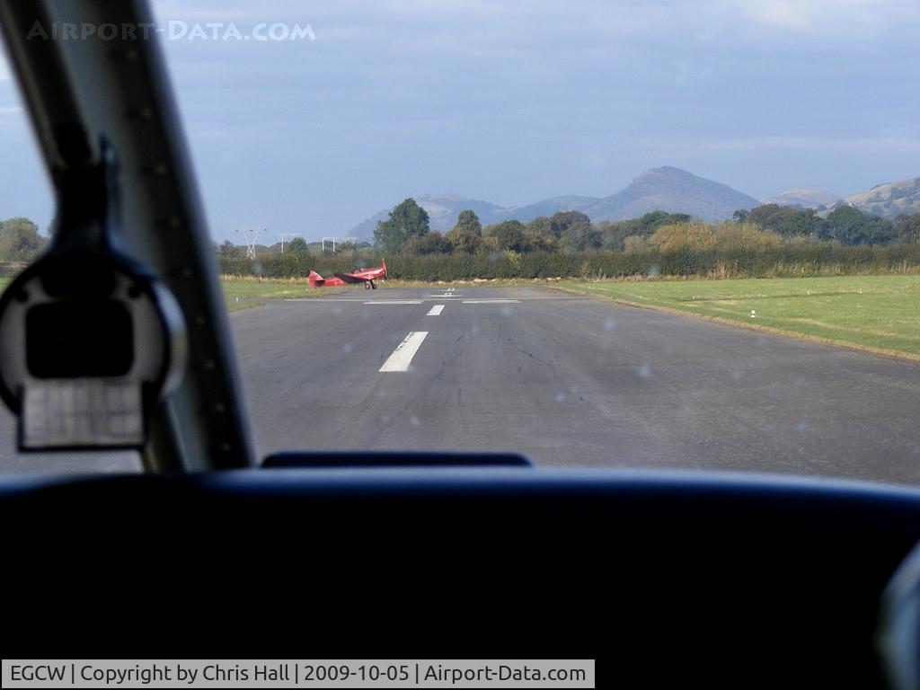 Welshpool Airport, Welshpool, Wales United Kingdom (EGCW) - G-AFPN De Havilland DH94 Moth Minor is lining up for departure as we back track down the runway