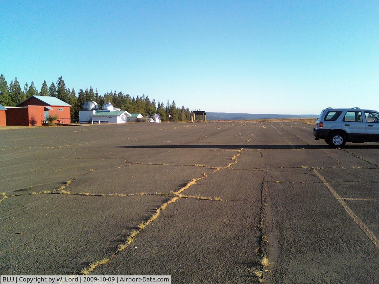 Blue Canyon - Nyack Airport (BLU) - Parking apron, looking south. Buildings are observatories, no services