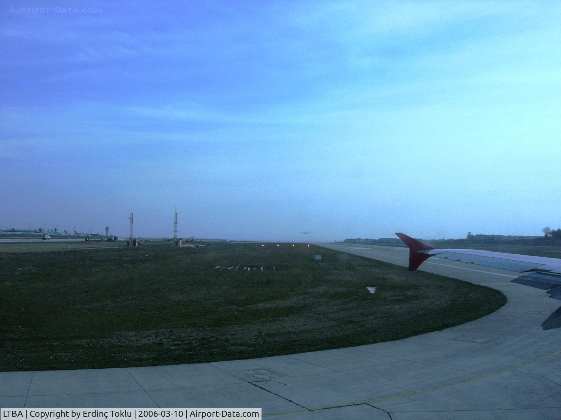 Istanbul Atatürk International Airport, Istanbul Turkey (LTBA) - Lining up at Rwy 18L. One aircraft has justed lifted off.