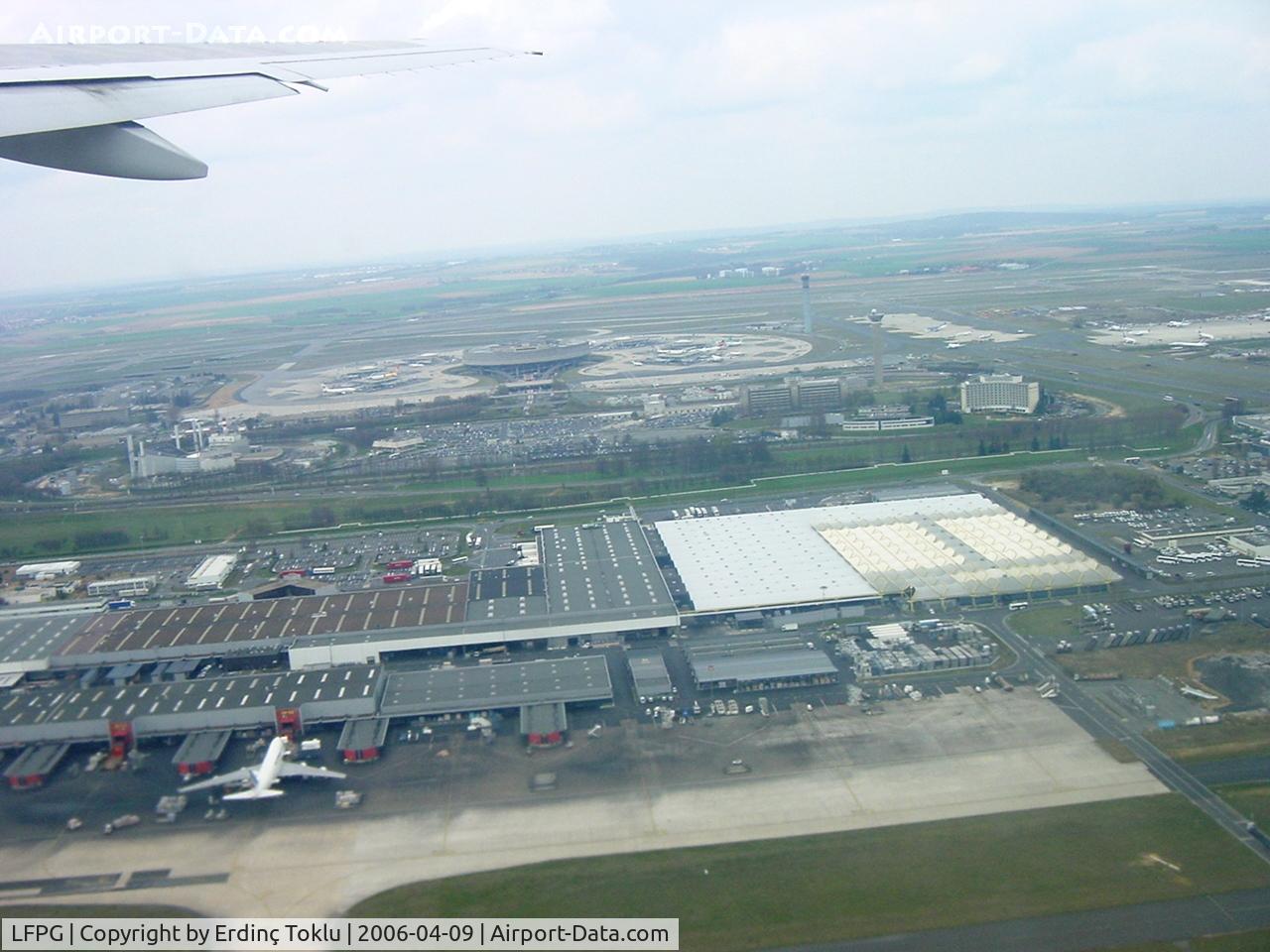 Paris Charles de Gaulle Airport (Roissy Airport), Paris France (LFPG) - Just took off for Dubaï from 08 at Roissy CDG. Terminal 1 in the background.