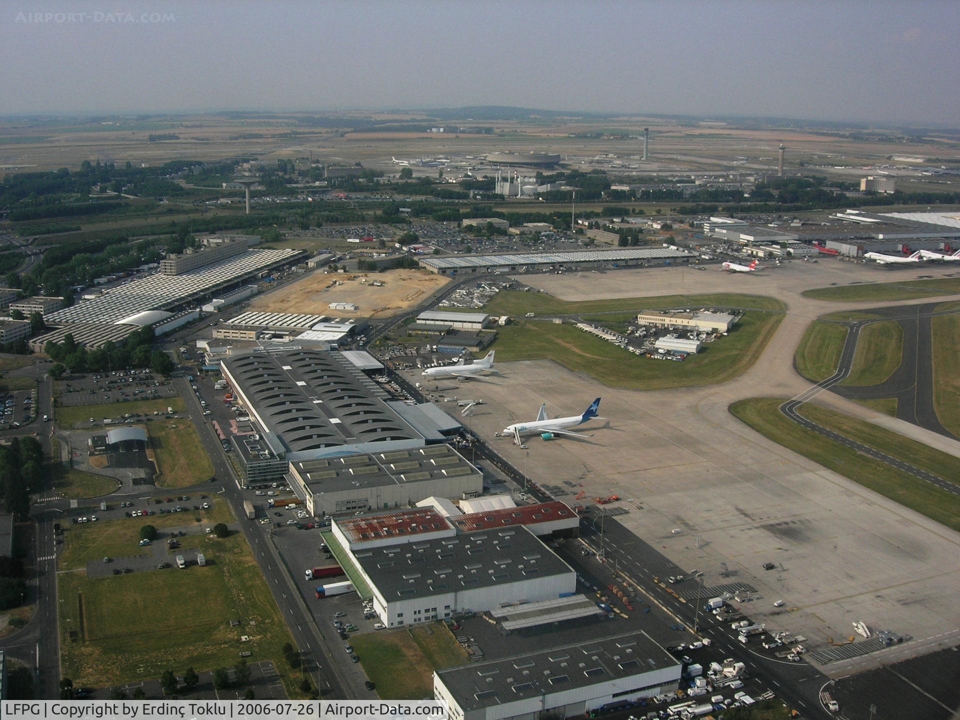 Paris Charles de Gaulle Airport (Roissy Airport), Paris France (LFPG) - On short final Rwy 08R at CDG-Maintenance area