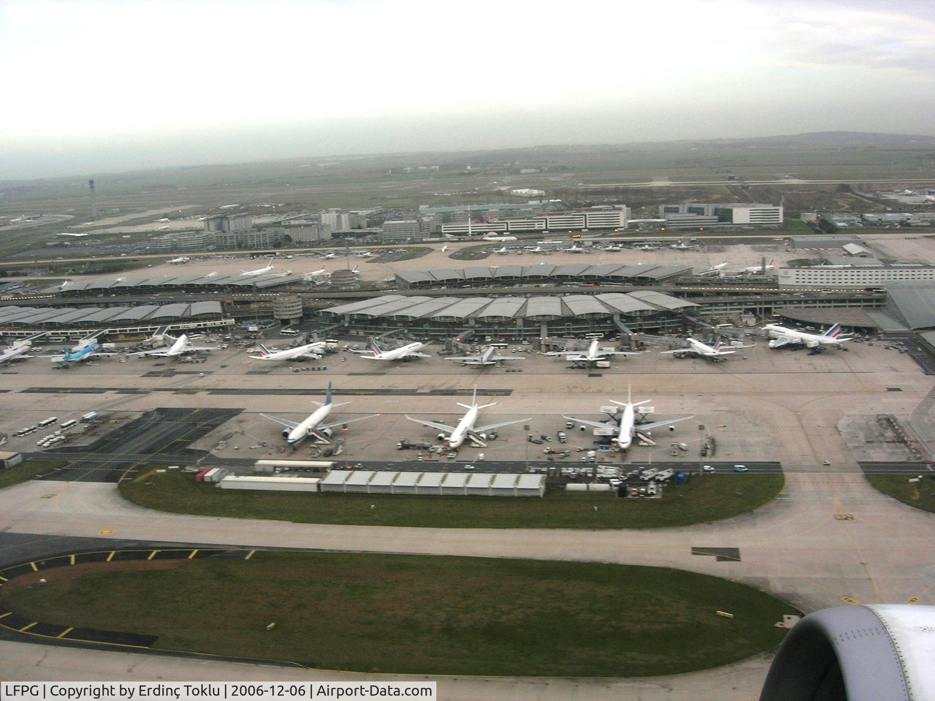 Paris Charles de Gaulle Airport (Roissy Airport), Paris France (LFPG) - Roissy CDG Terminal 2A,B,C,D. Climbing from 26L. C and A in front right to left, D and B in the back right to left.